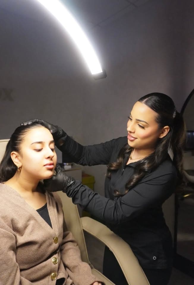 Fatima Khan consulting with a client at Injectox Clinic